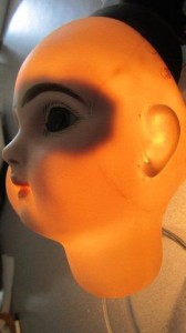 Jumeau 8 after restoration repair on bisque doll head side view