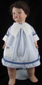 Antique mama doll dress in blue and white strip with cording