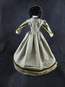 Civil War era cotton doll dress with latice and rayon trim, matching bonnet